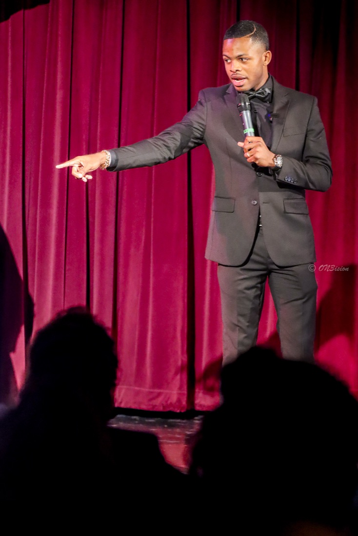 Brother Ben X teaching on stage
